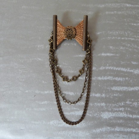 Broche noeud et tombé de chaînes fantaisie